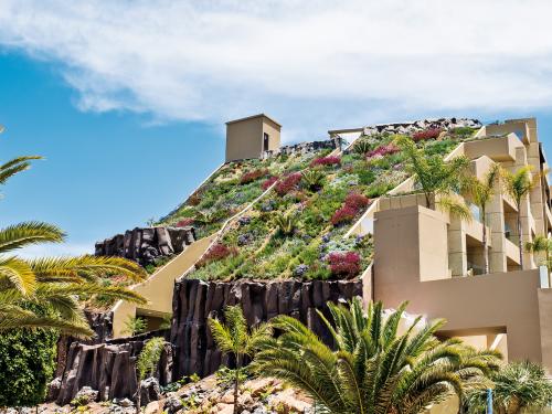 Steep pitched green roof in full blossom